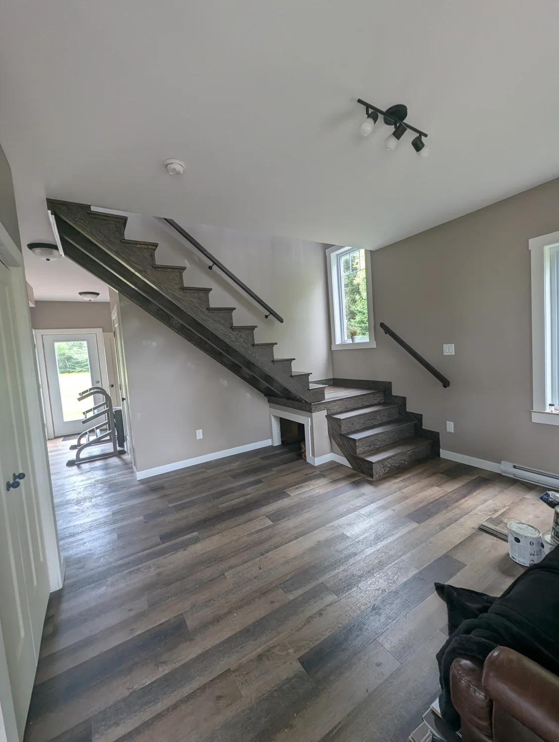 Modern open-riser staircase in a finished interior